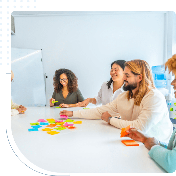 Team brainstorming with colorful sticky notes.