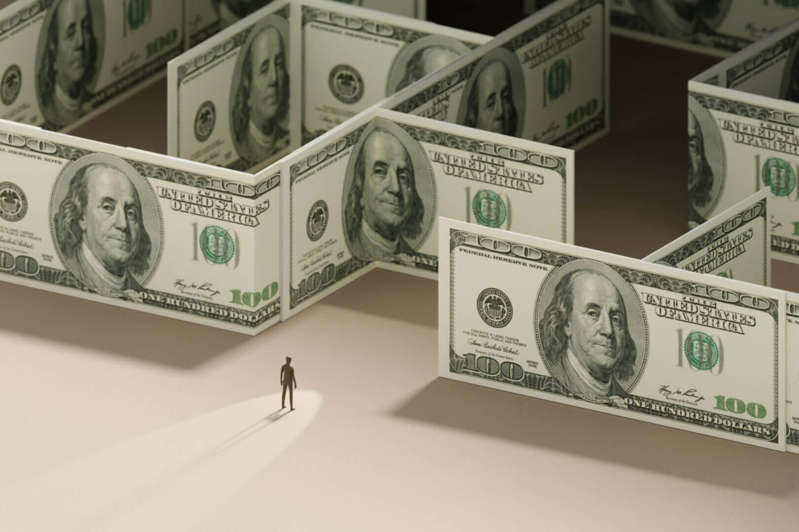 Person standing near maze of dollar bills.