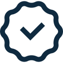 Checkmark in a scalloped circular badge.